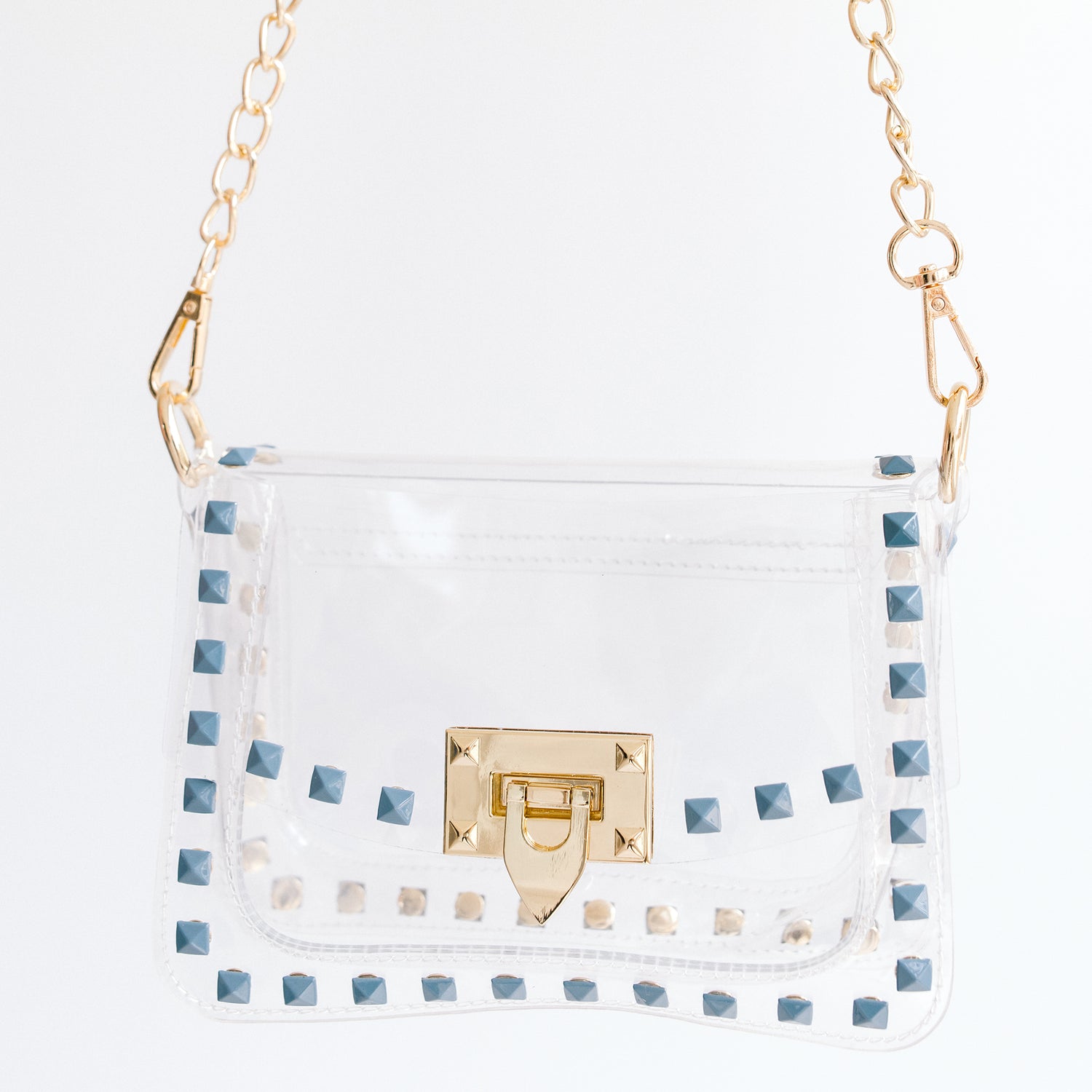Clear stadium approved handbag with grey studs and gold hardware. Gold chain included.